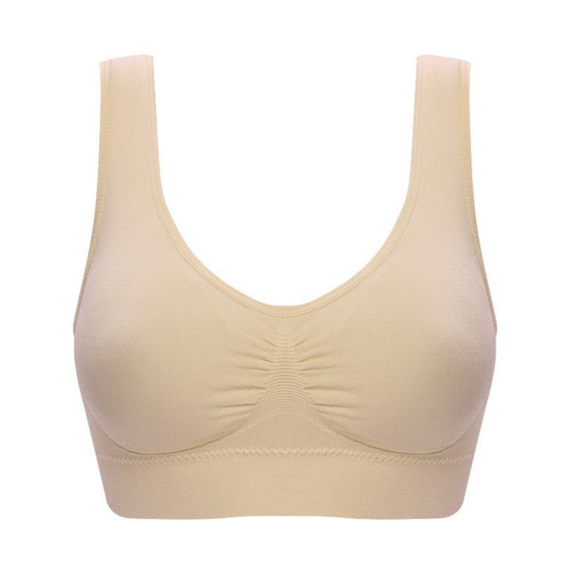 Plus size seamless bra with pads in skin color, nylon fabric, designed for women, available in sizes up to 6XL.