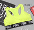 Neon yellow Training Pro Women Sports Bra with "PINK" strap detail.