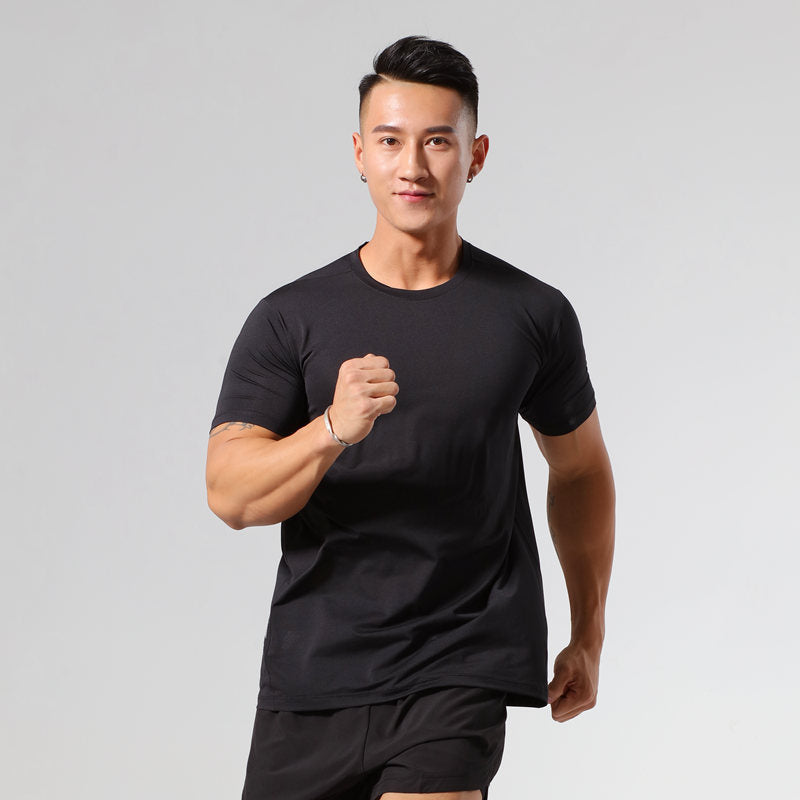 Running fitness quick-drying top in black ice silk stretch fabric on male model.