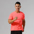 Man wearing fluorescent orange quick-drying running fitness top.