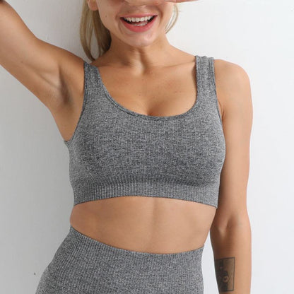 Seamless gray fitness bra for women, professional sportswear.