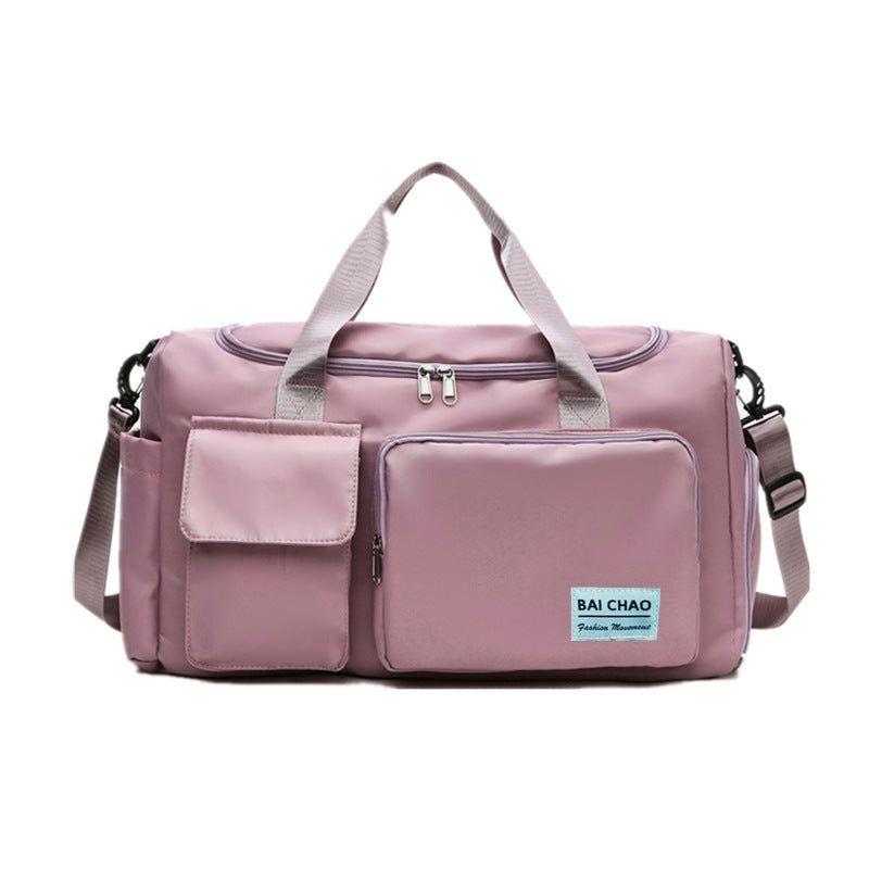 Large-capacity water-repellent short-distance travel bag with multiple compartments and soft handle.