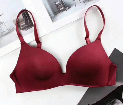 Red seamless push-up bra made of nylon fabric.