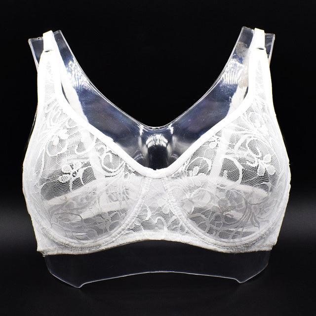 Plus size lace bra for women, underwired, hollow design, white color.