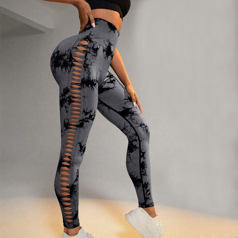 Hollow Tie Dye Printed Yoga Pants with high waist and seamless butt lift design, showcasing unique pattern in black and gray tones.