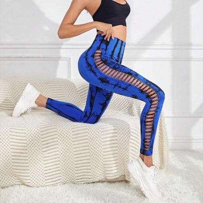 Hollow Tie Dye Printed Yoga Pants in blue showing high waist and seamless design with hollow side detail.