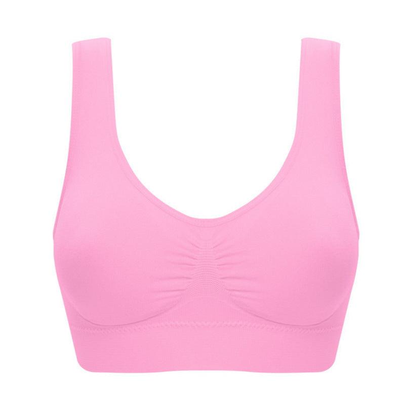 Plus size seamless bra for women in pink with padded cups and no steel ring.