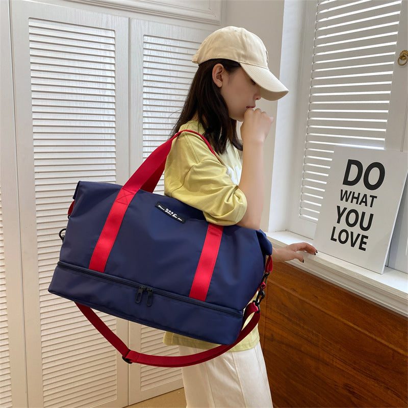 Fashionable oxford cloth gym bag with shoes compartment and waterproof feature.