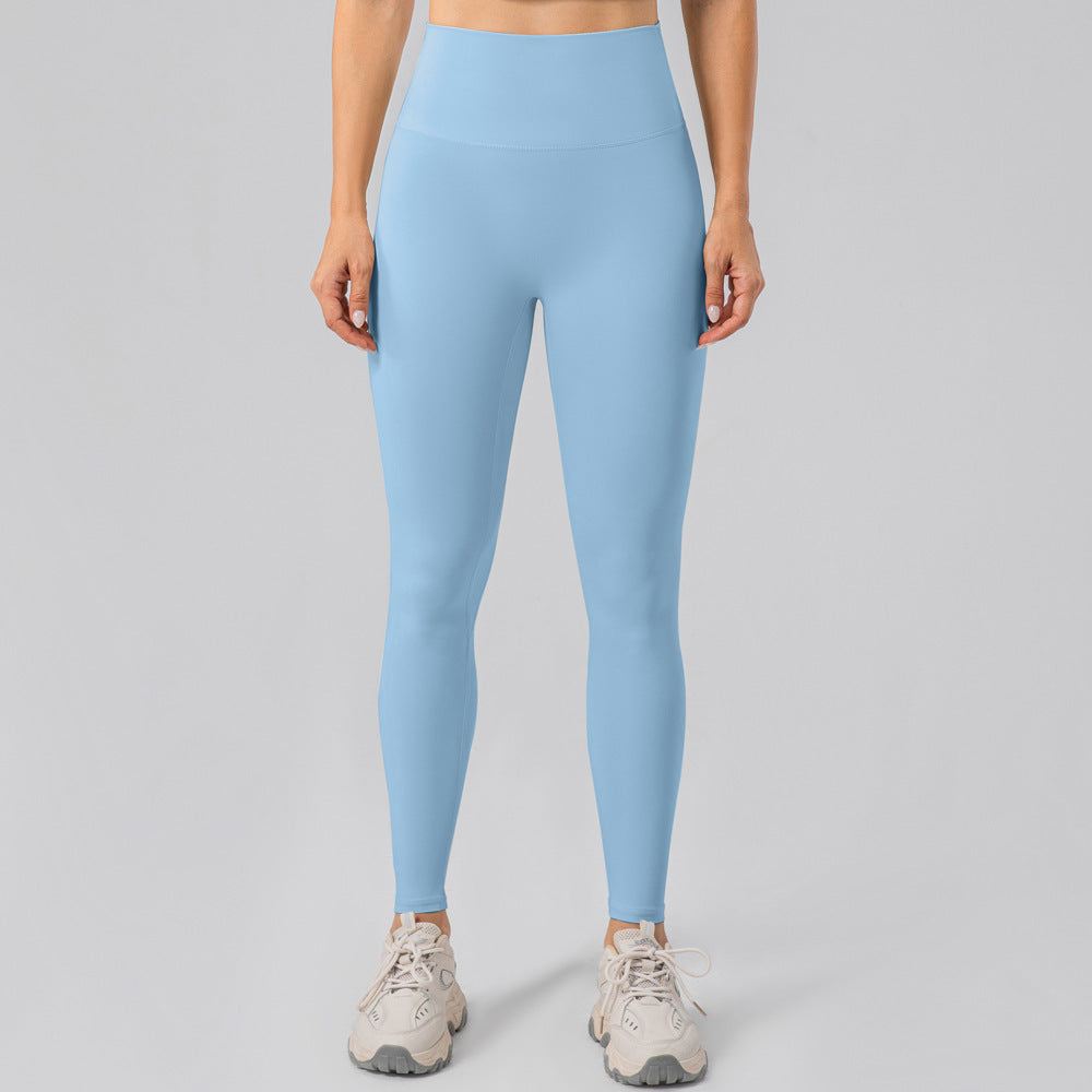 Sky blue shockproof yoga leggings paired with a matching sports bra.